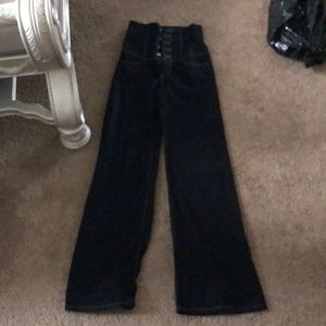 Blue jean pants with 4 buttons in the front